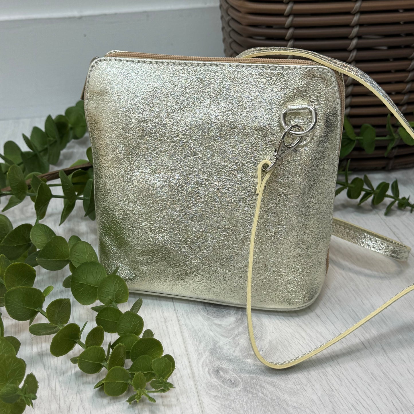 Thea: Gold leather cross body/clutch bag.