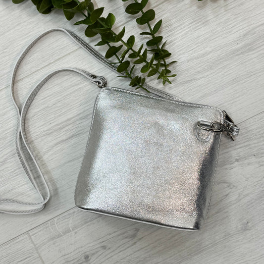 Thea: Silver leather cross body/clutch bag.