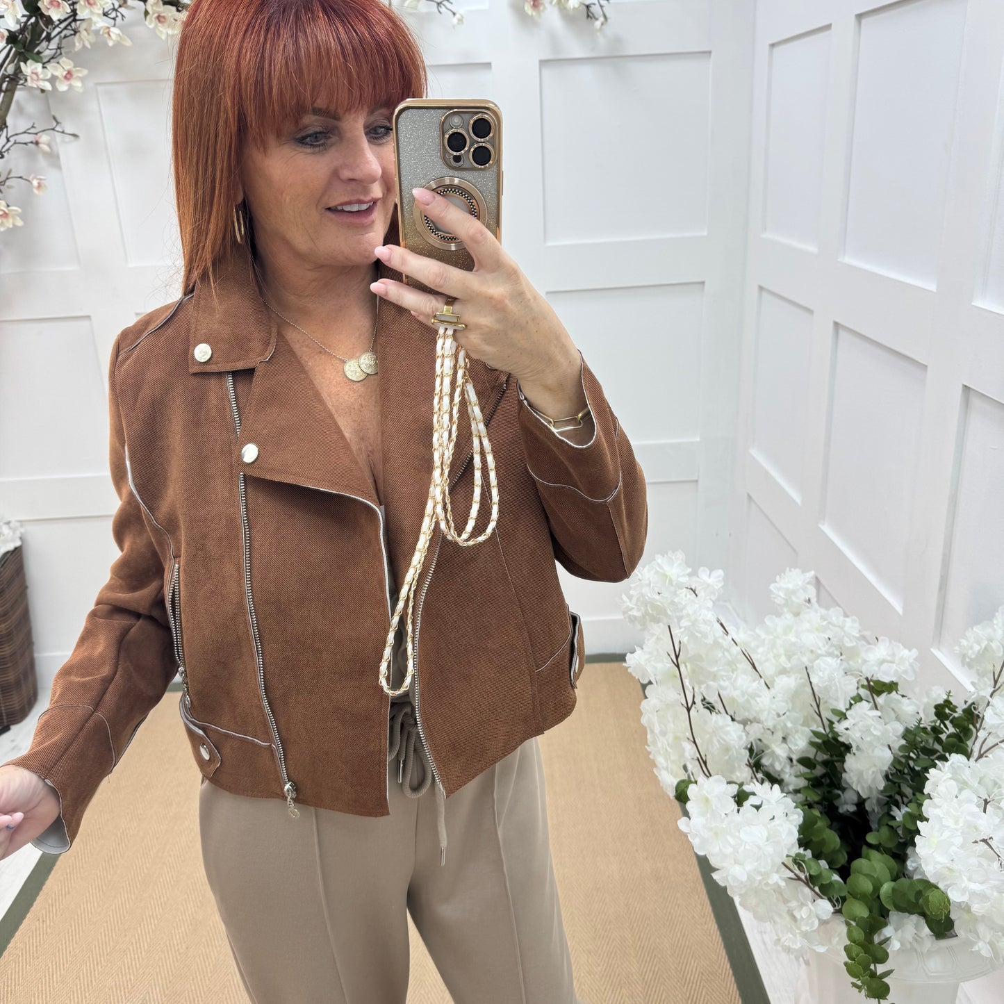 Dorita: Tan soft feel biker jacket. 3 sizes