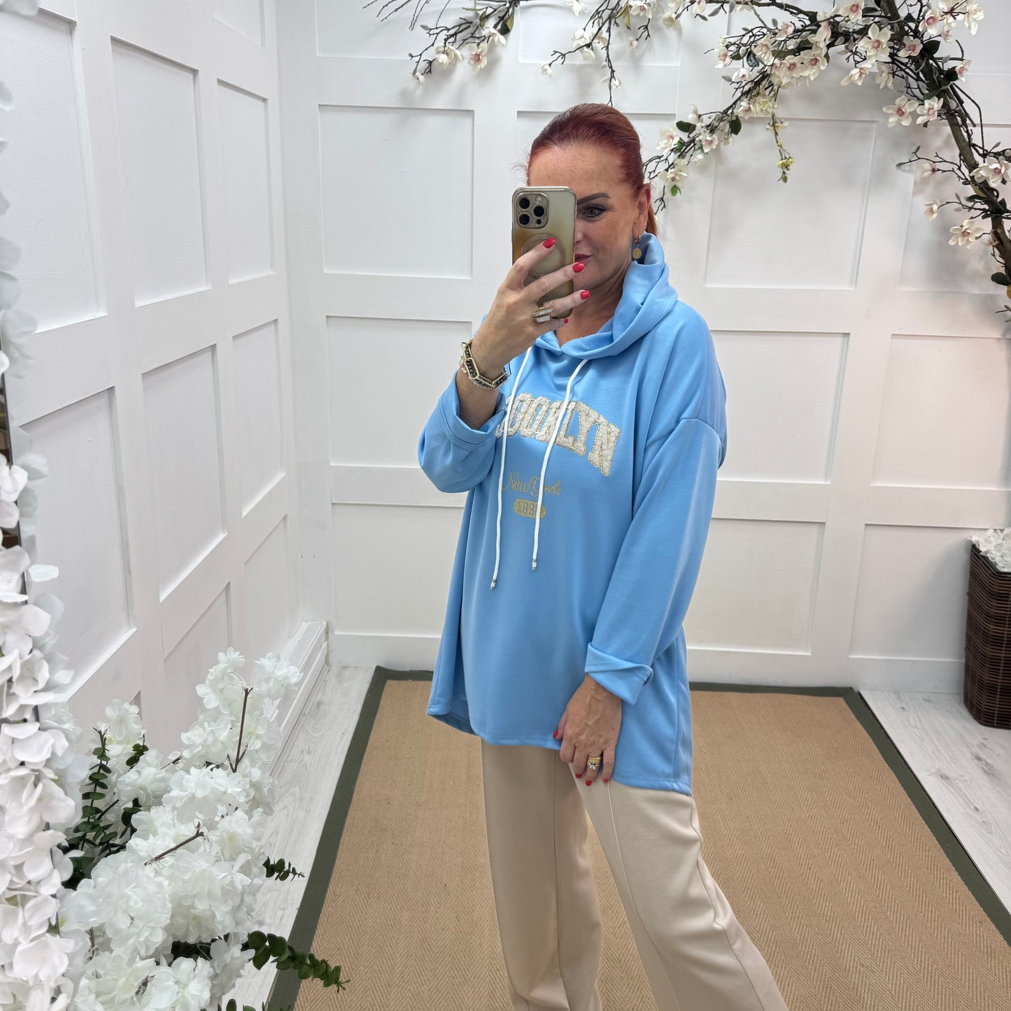 Madison: Baby blue Brooklyn logo hoodie. One size: 12-18