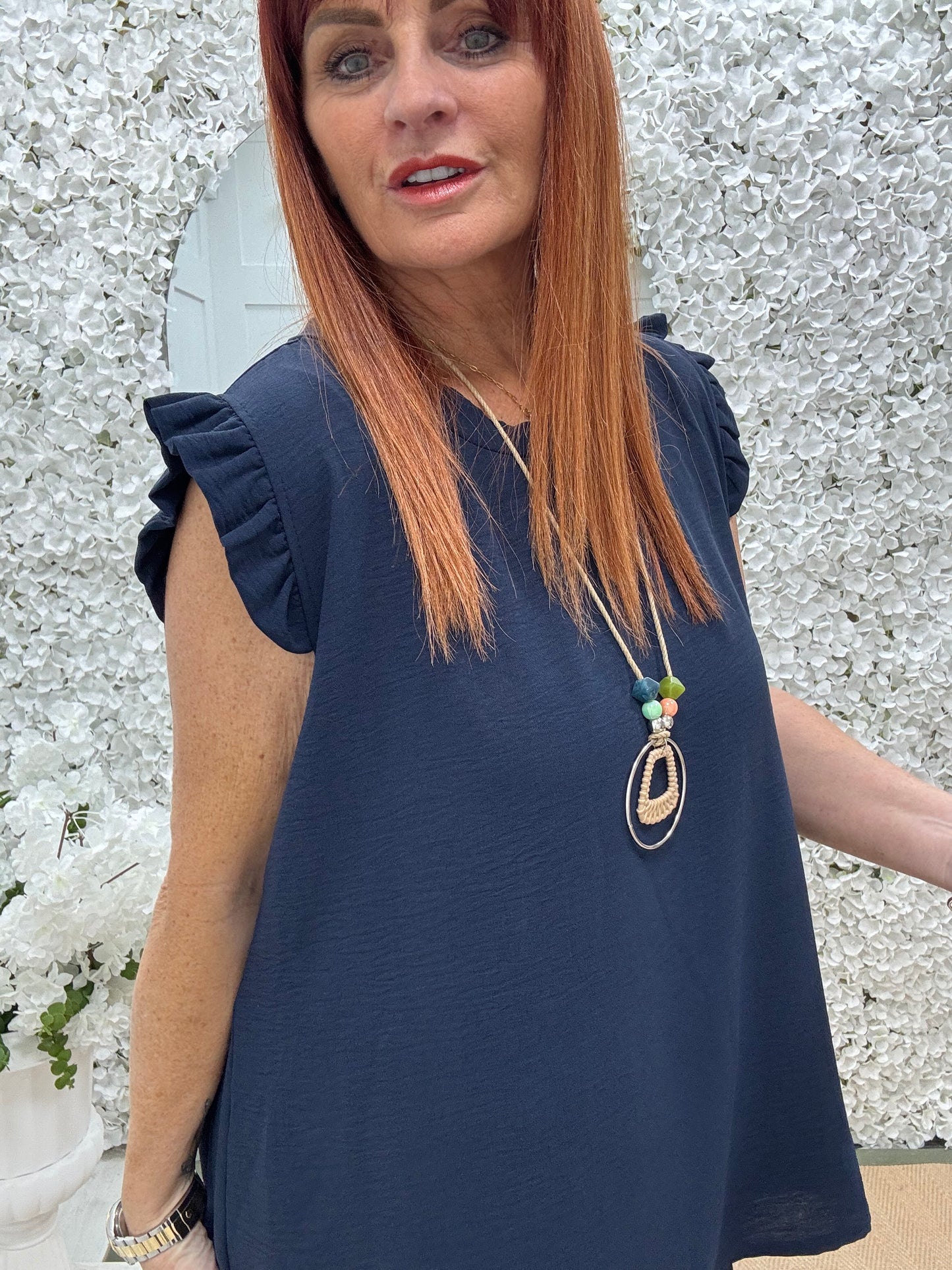 Ember: Navy frill sleeve top & pendant. One size: 14-20