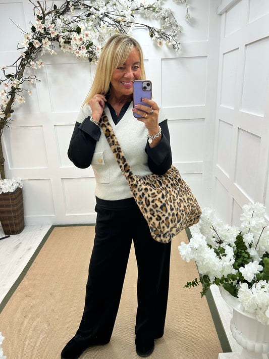 Rhona: Oatmeal sleeveless tank top. One Sz: 12-18