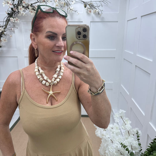 Iman: Chunky pearl & gold starfish necklace