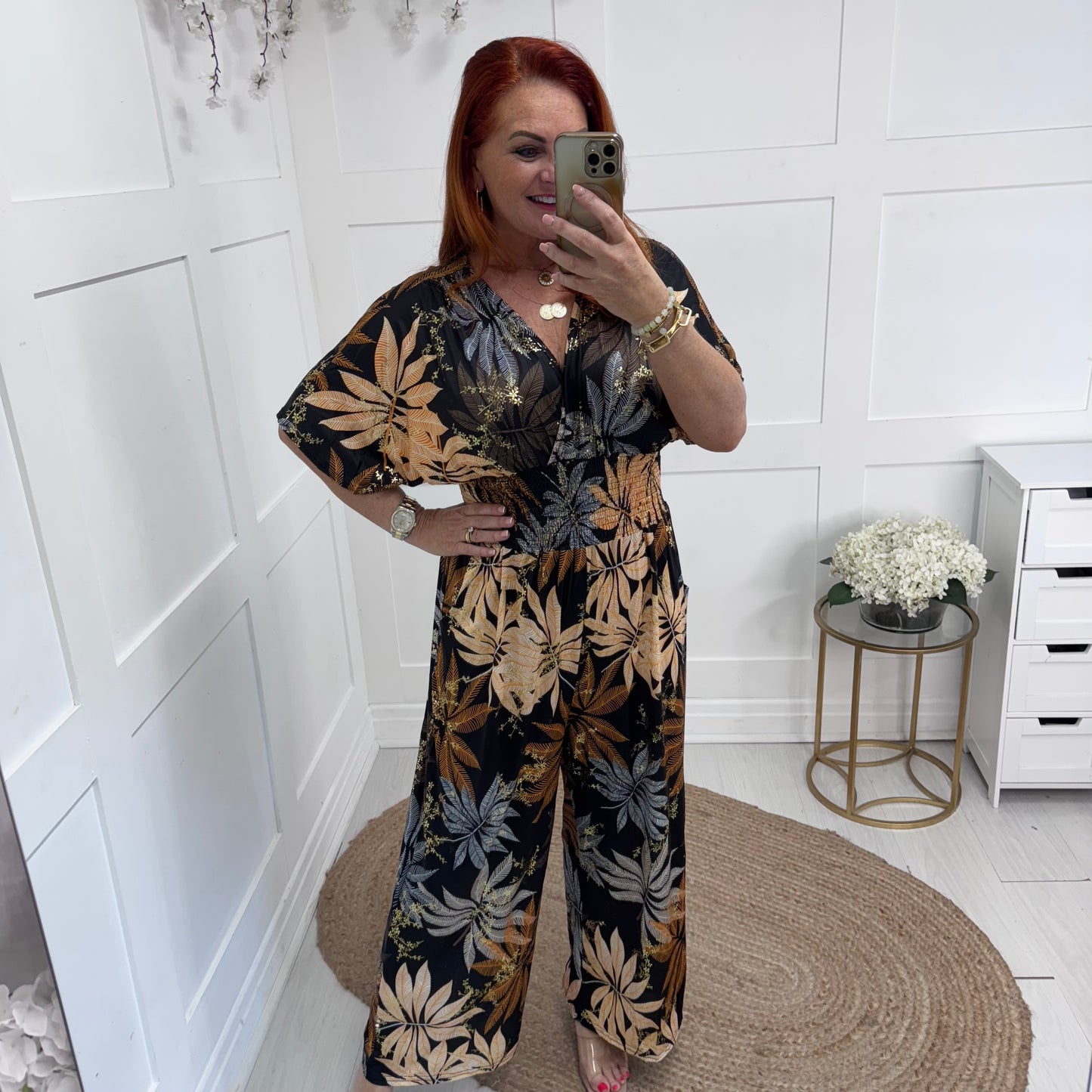 Maddie: Stretchy Black jumpsuit with pockets. One size: 12-20