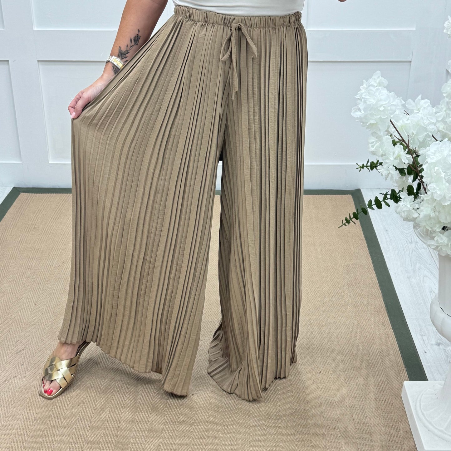 Payton: Sand pleated wide leg trousers. One size: 12-22/24