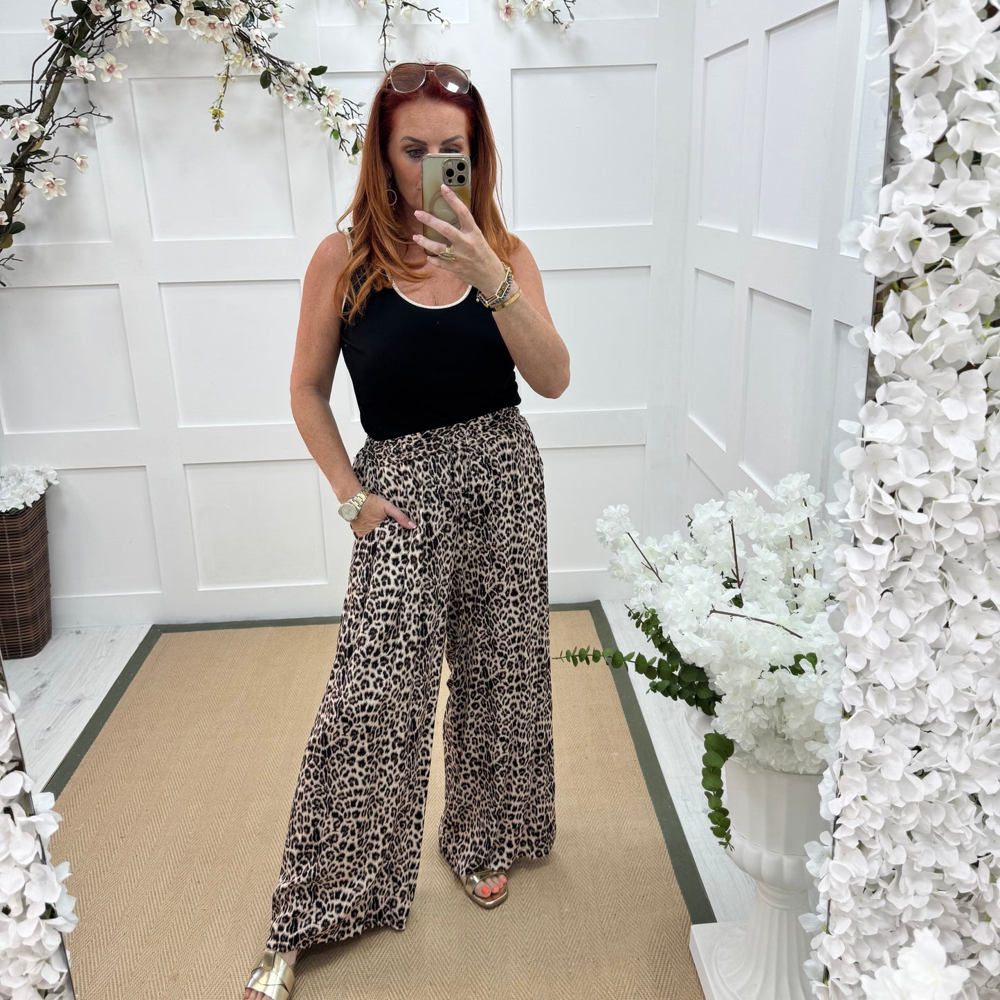 Polly: Leopard print wide leg trousers. One Sz: 10-16