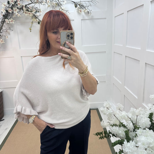 Sierra: Cream batwing fluted sleeve knitted top. One Size 12-18/20