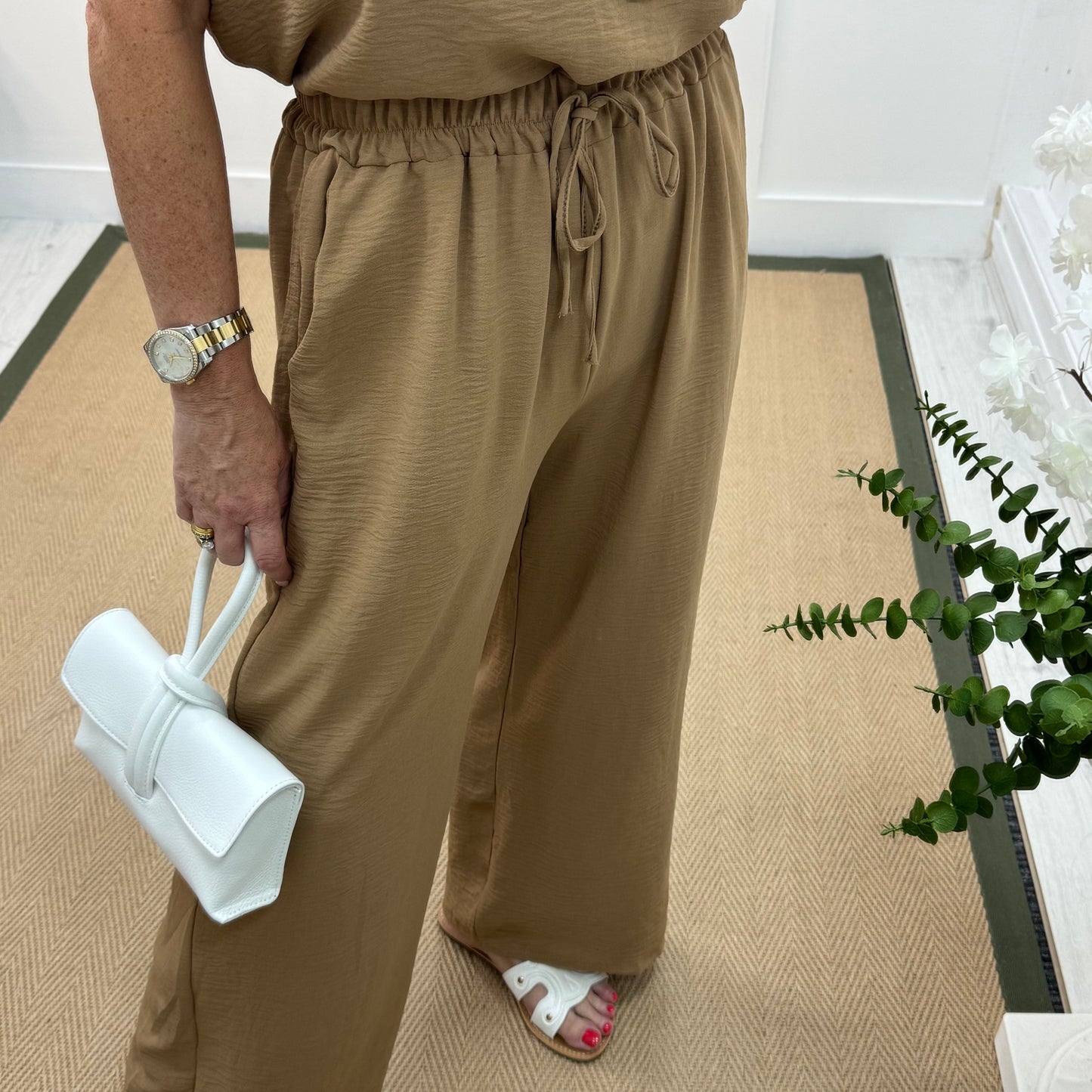 Esme: Sand pocket wide leg trousers. One size: 12-20