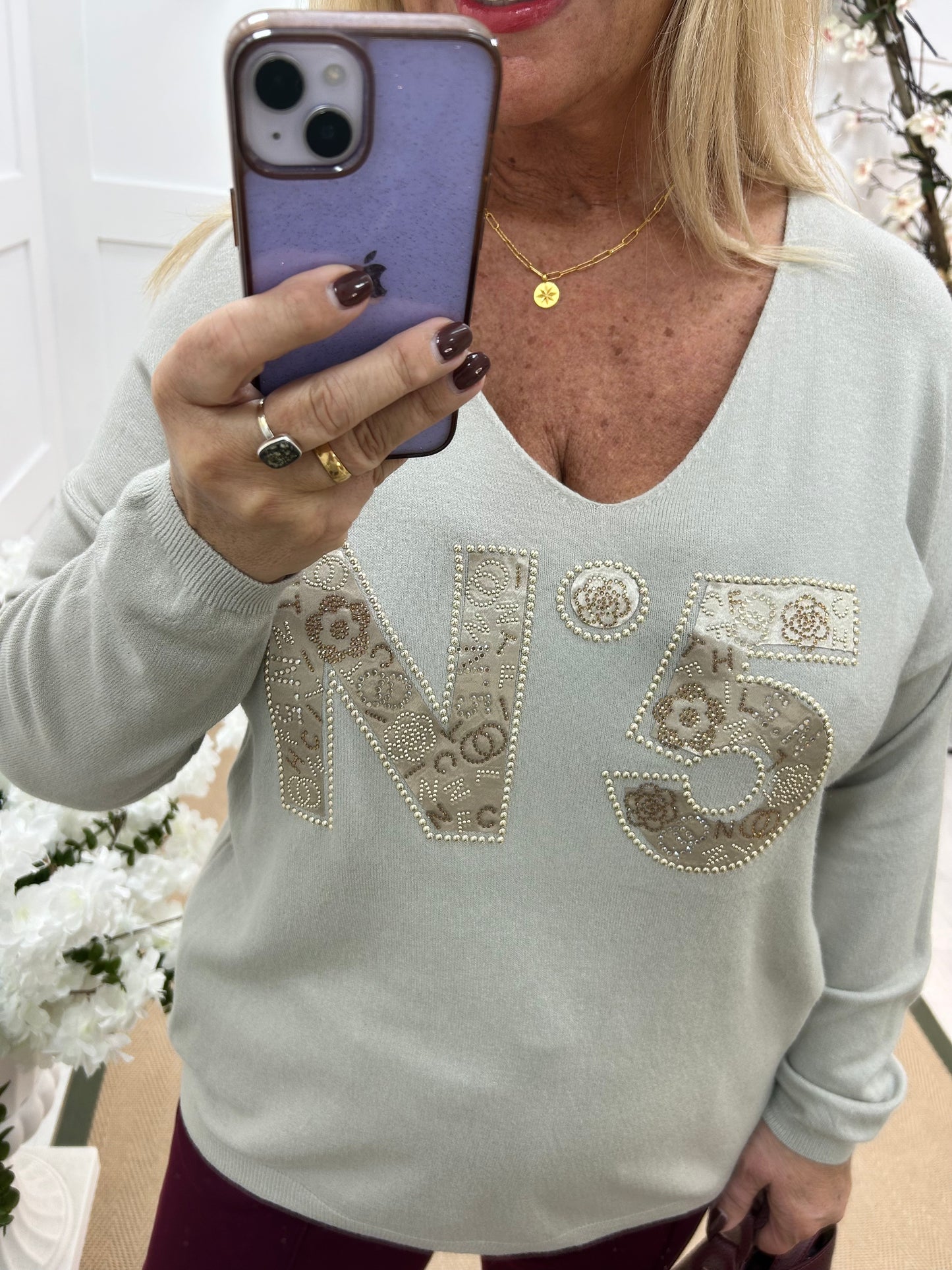 Cass: Stone V neck diamanté No5 knit top. One size: 14-20