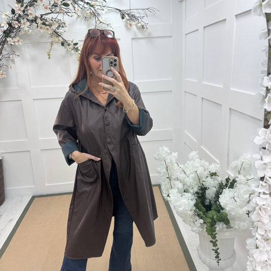Alma: Brown long hooded raincoat. One size 12-18