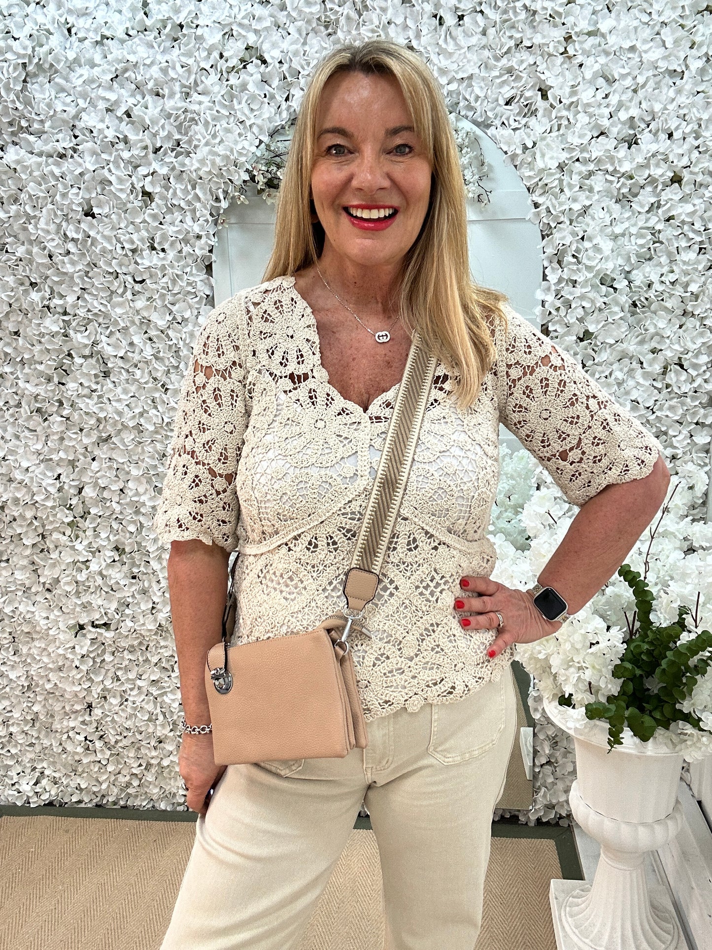 Ellie: Cream V neck short sleeved floral crochet top. One size: 10-16