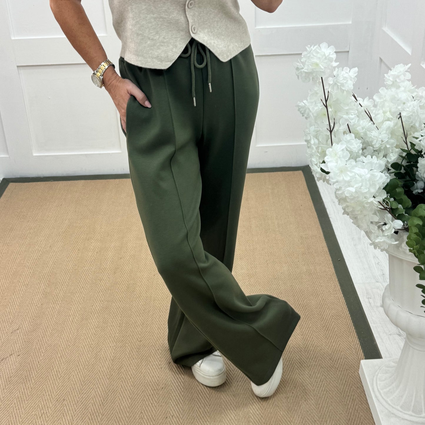 Trudy: Khaki stretchy wide leg pocket trousers. 2 sizes