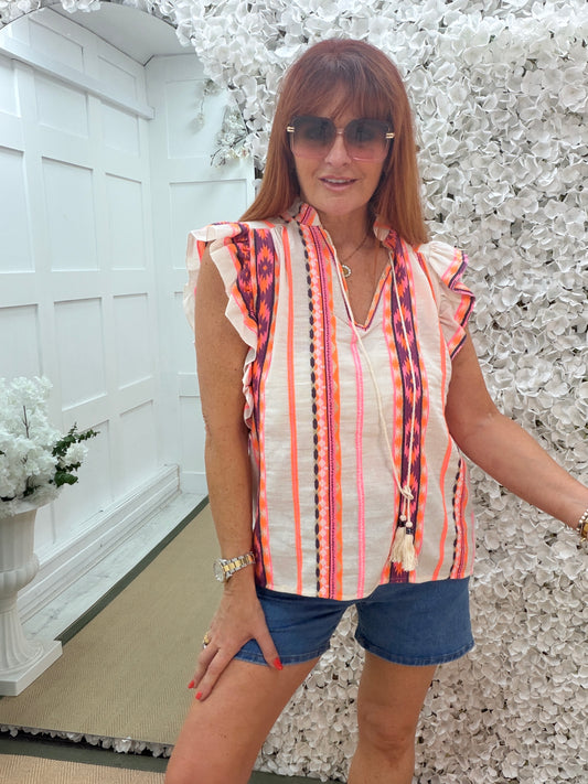 Alana: Aztec printed V neck tassel top. One size: 12-16. 2 colours