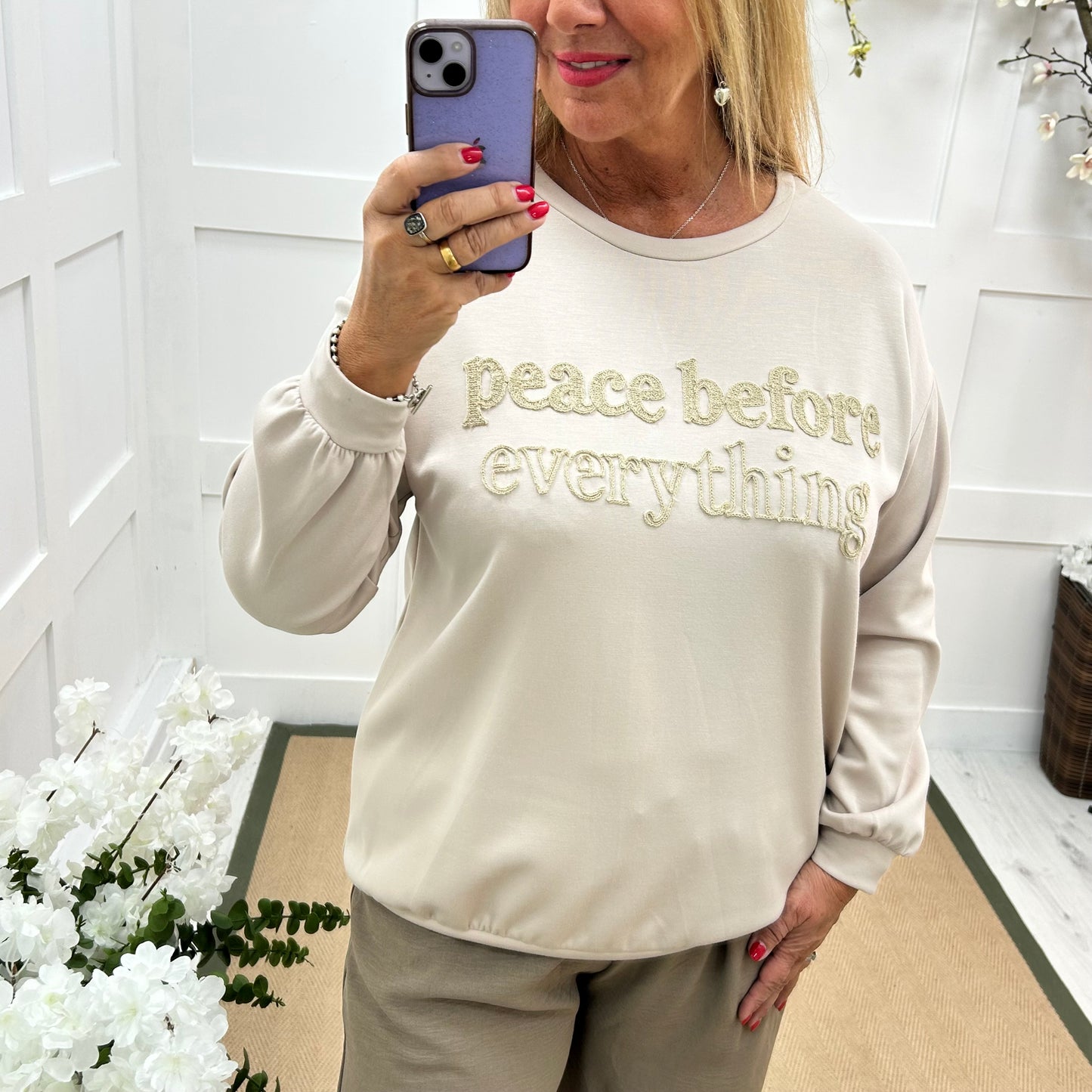 Prya: Cream oversized Peace slogan sweatshirt. One size: 14-20
