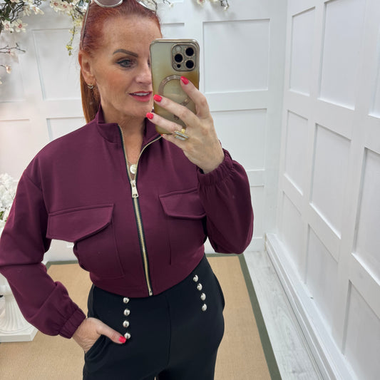 Bunty: Burgundy stretchy short bomber jacket. One size: 8-16