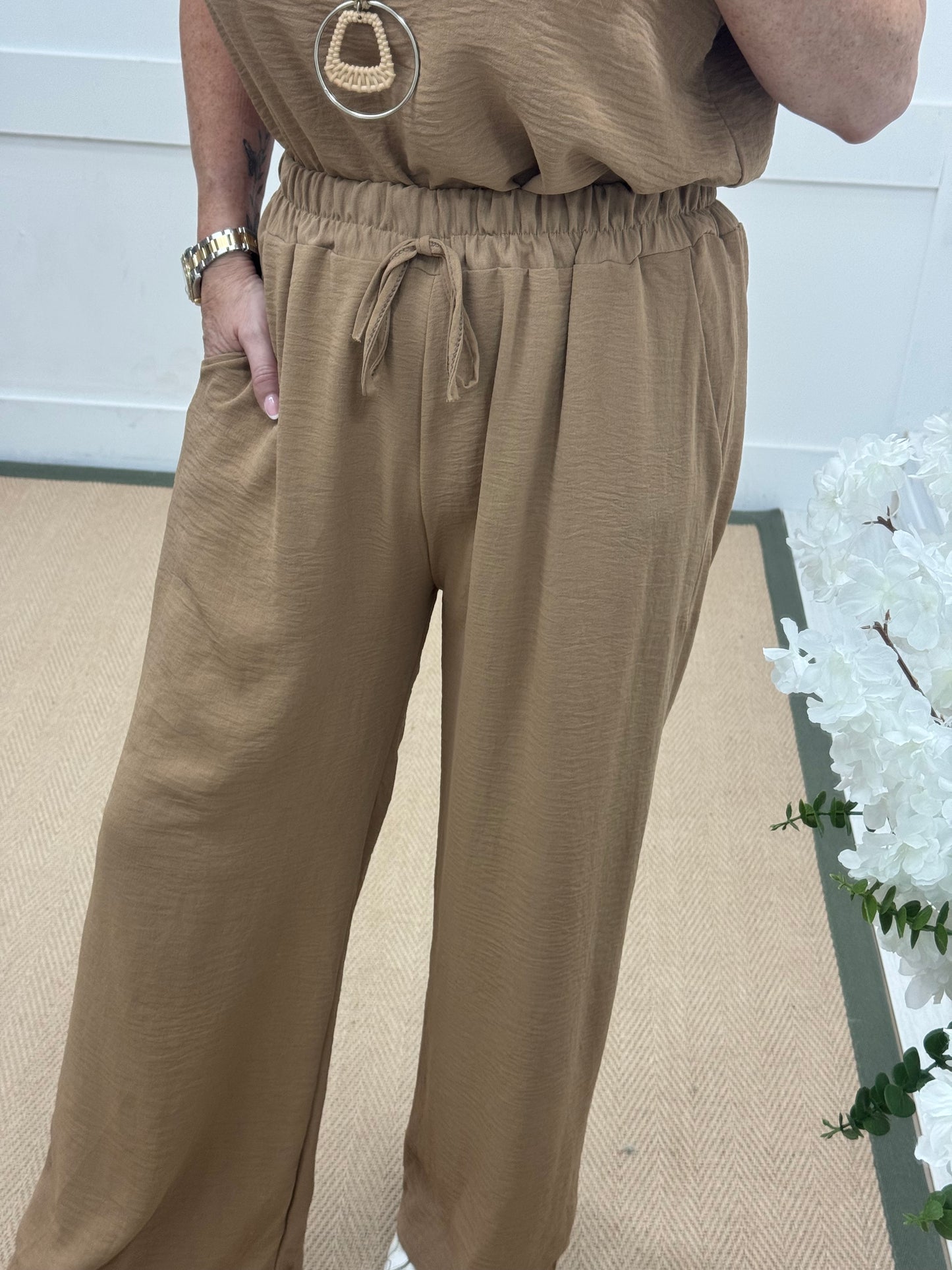 Esme: Sand pocket wide leg trousers. One size: 12-20