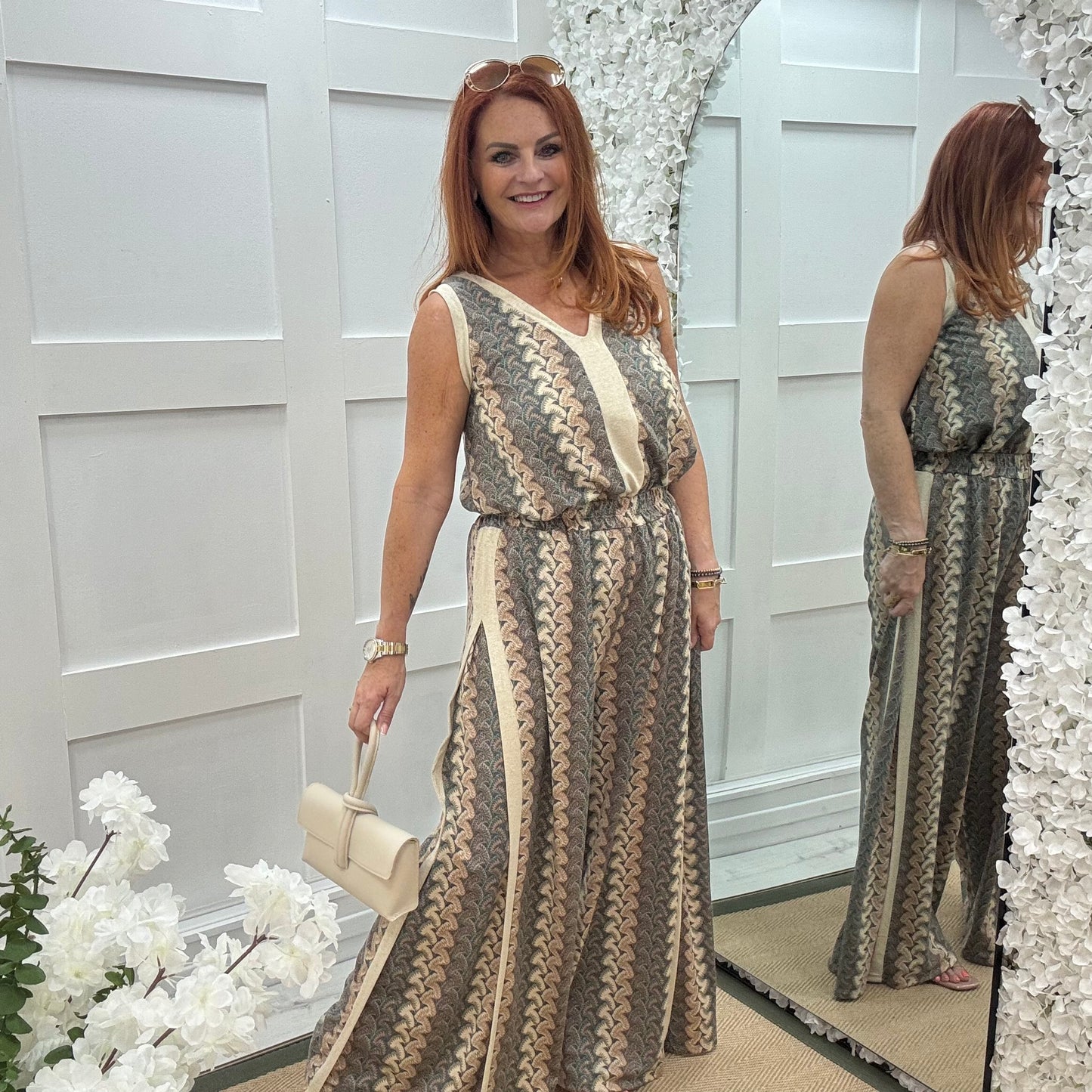 Pasha: Cream zigzag top & printed trouser co-ord set. One size: 12-18