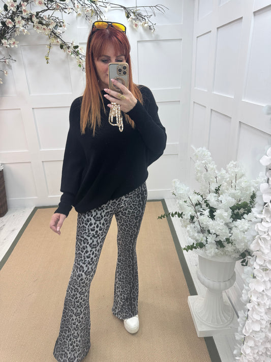 Bekah: Grey leopard print bell bottom flares. 3 sizes