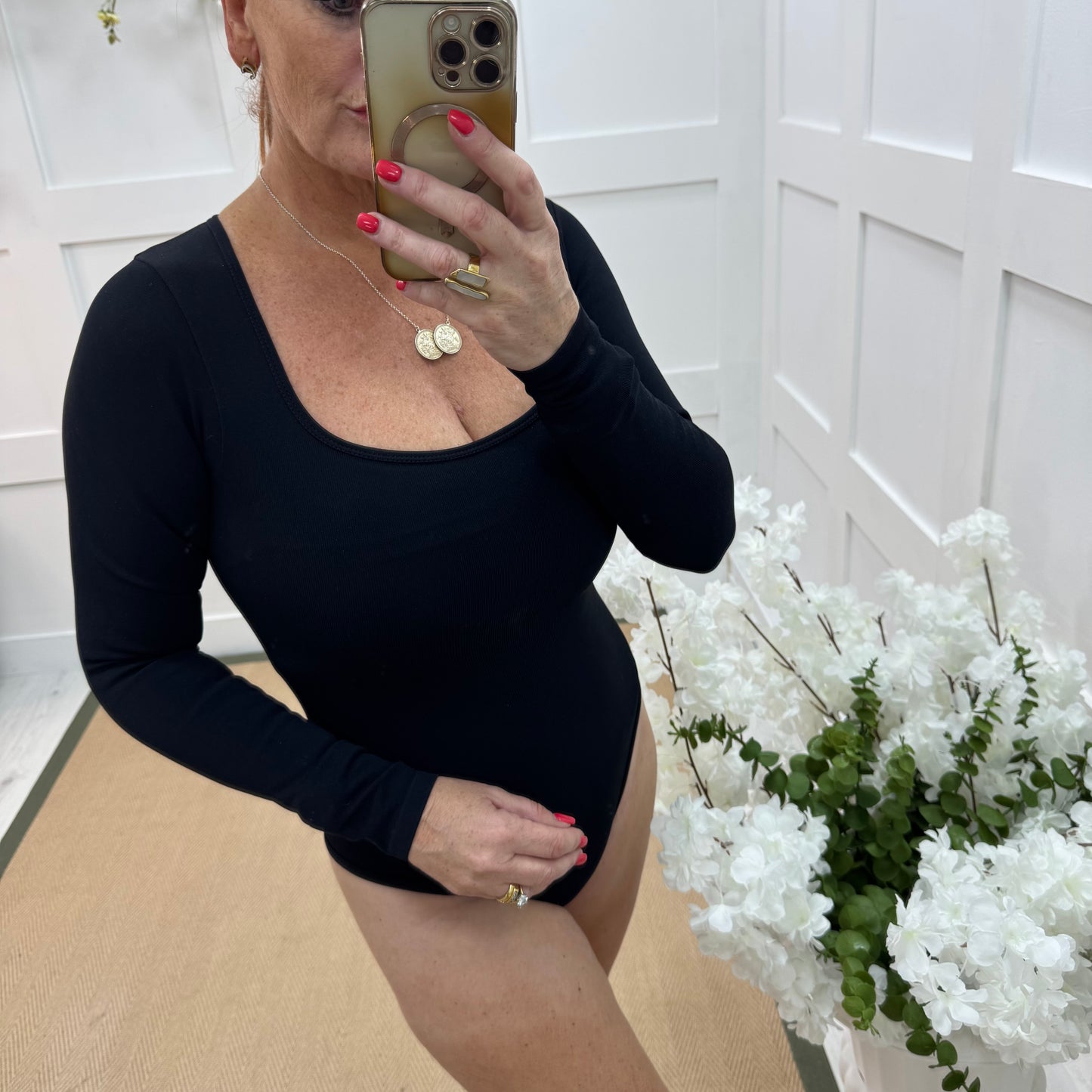 April: Black stretchy waist cinch bodysuit. 2 sizes