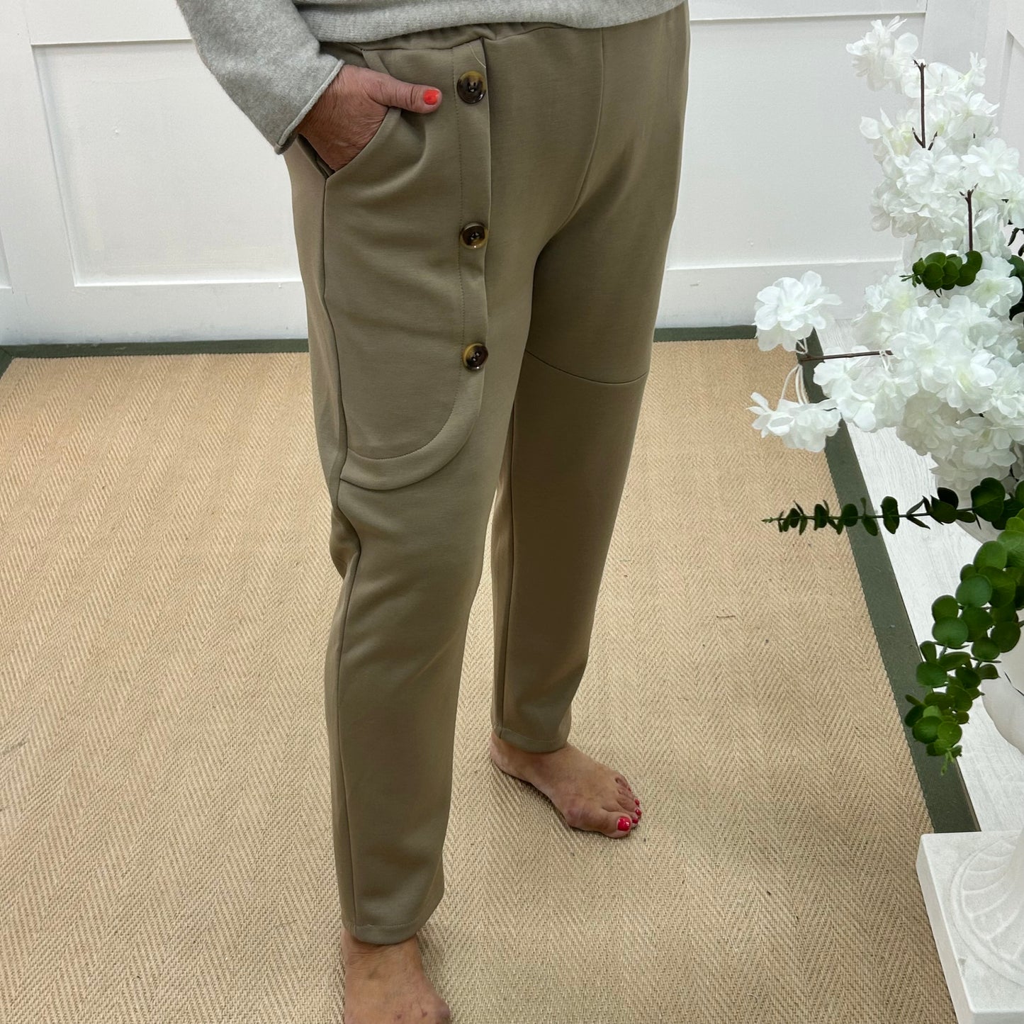 Monroe: Mocha stretchy button trousers. One size: 12-18