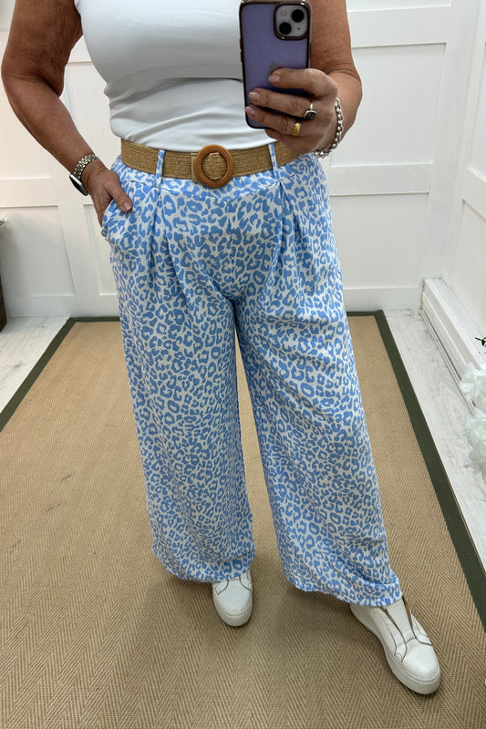 Lucy: Blue wide leg leopard print belted trousers. One size: 10-16