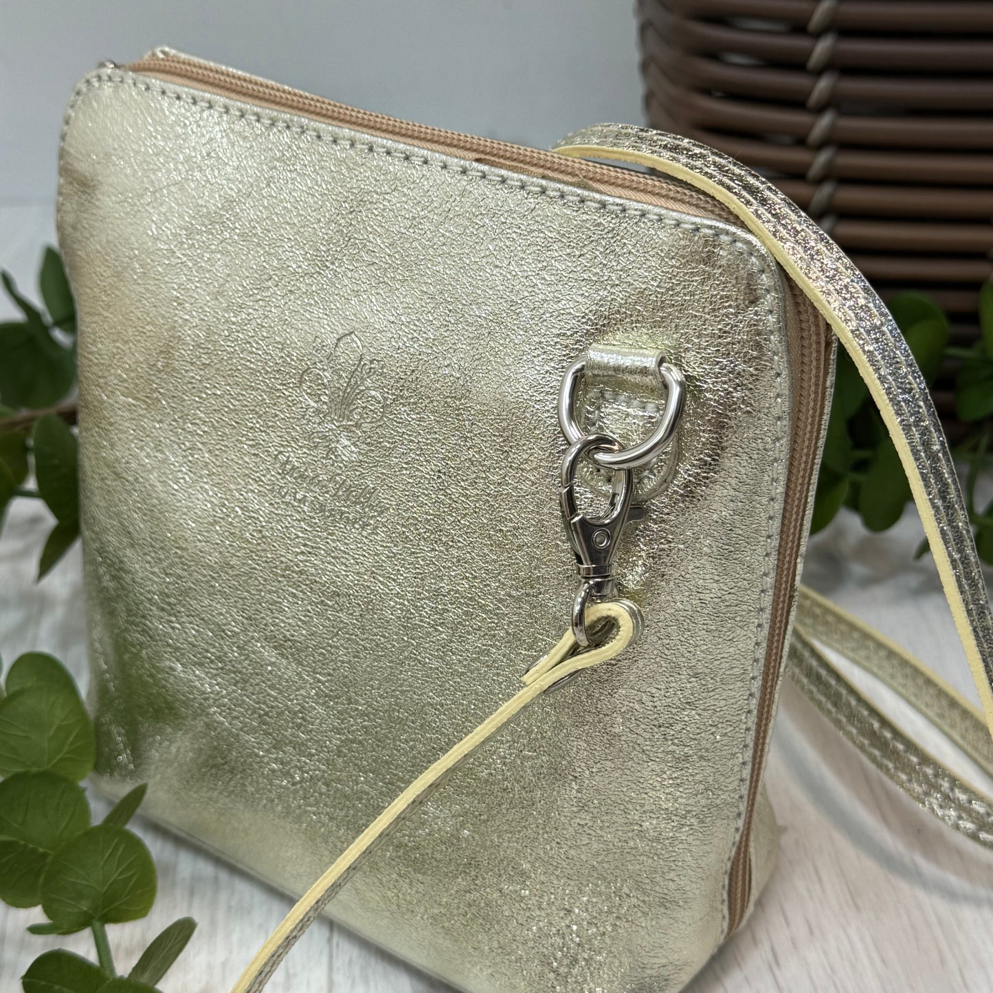 Thea: Gold leather cross body/clutch bag.