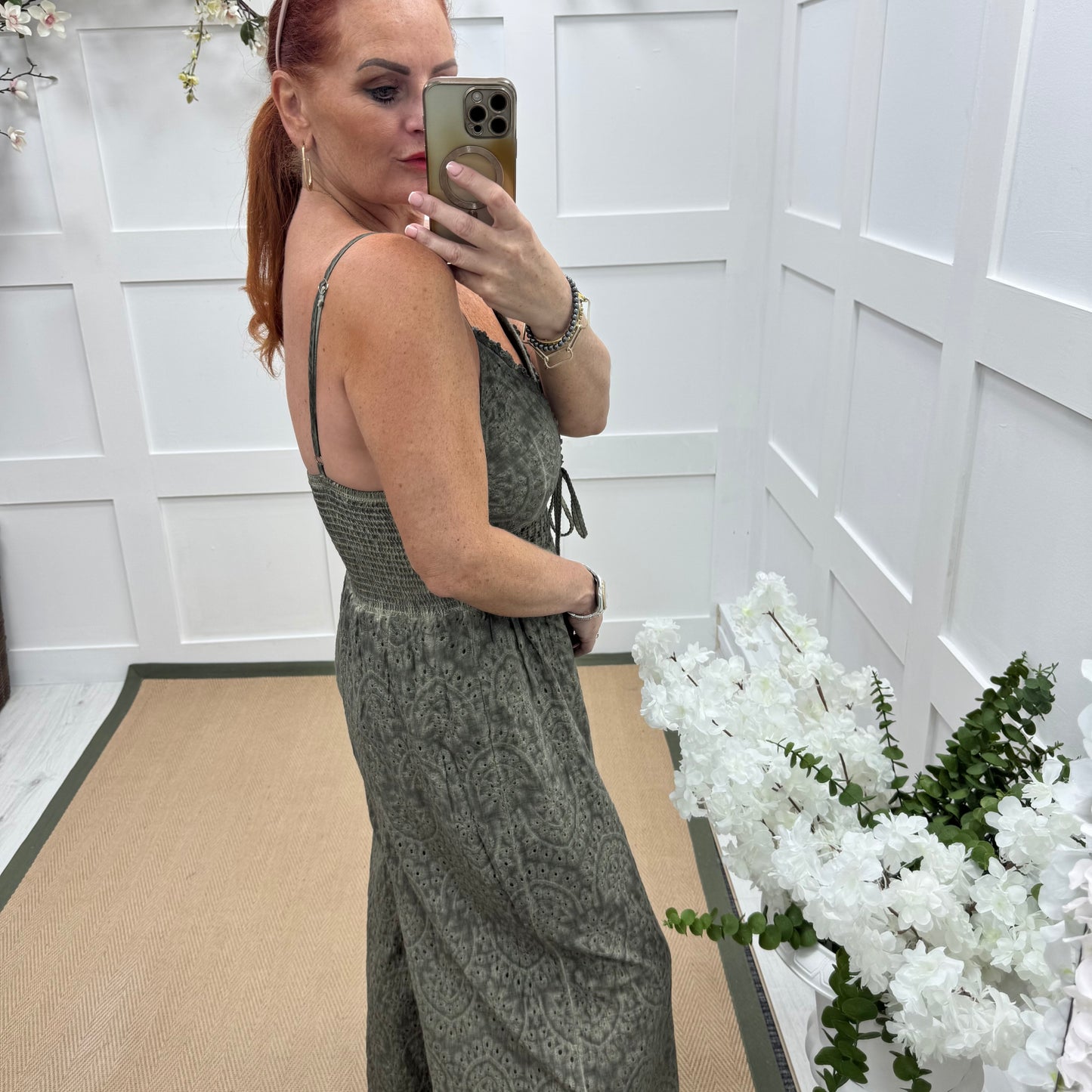 Bria: Grey broderie Anglaise strappy jumpsuit. One size: 10-14