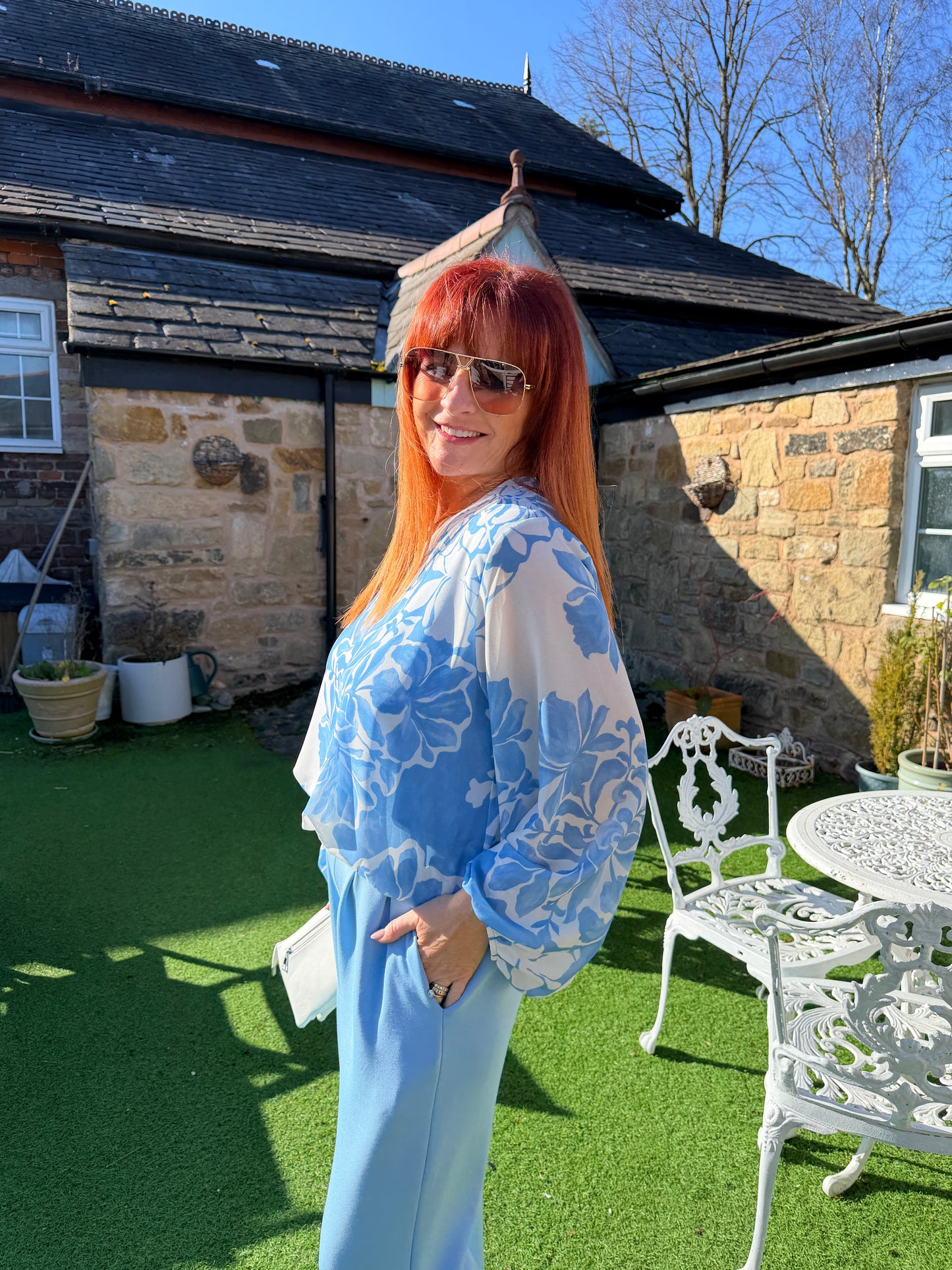 Vikki: Blue V neck floral print blouse. One size: 14-18