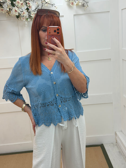 Effie: Blue embroidered V neck button top. One size: 12-18