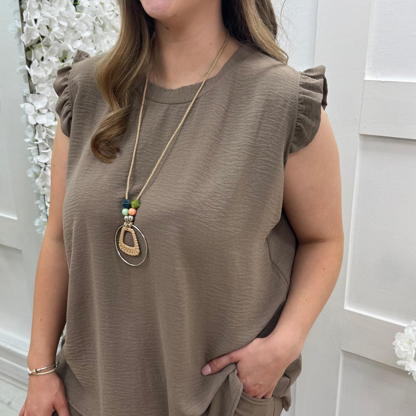 Ember: Mocha frill sleeve top & pendant. One size: 14-20