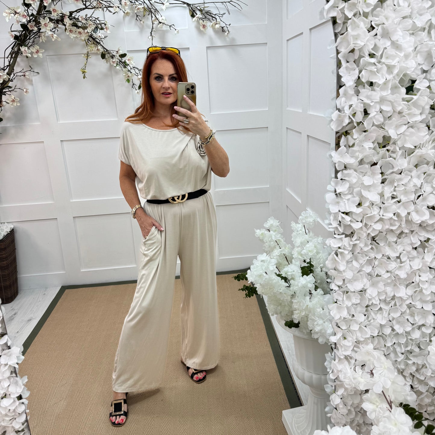Rhianna: Cream jersey draped wide leg jumpsuit. One size: 10-16