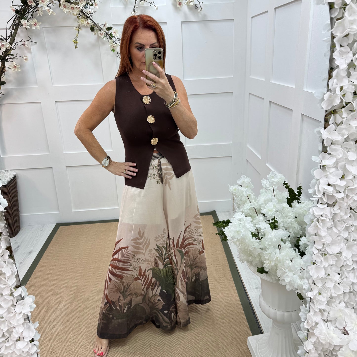 Lyra: Cream tropical print wide leg sheer trousers. One size: 8-14
