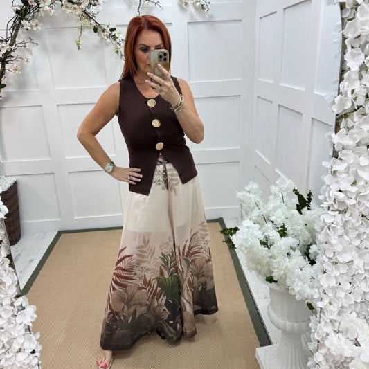 Lyra: Cream tropical print wide leg sheer trousers. One size: 8-14