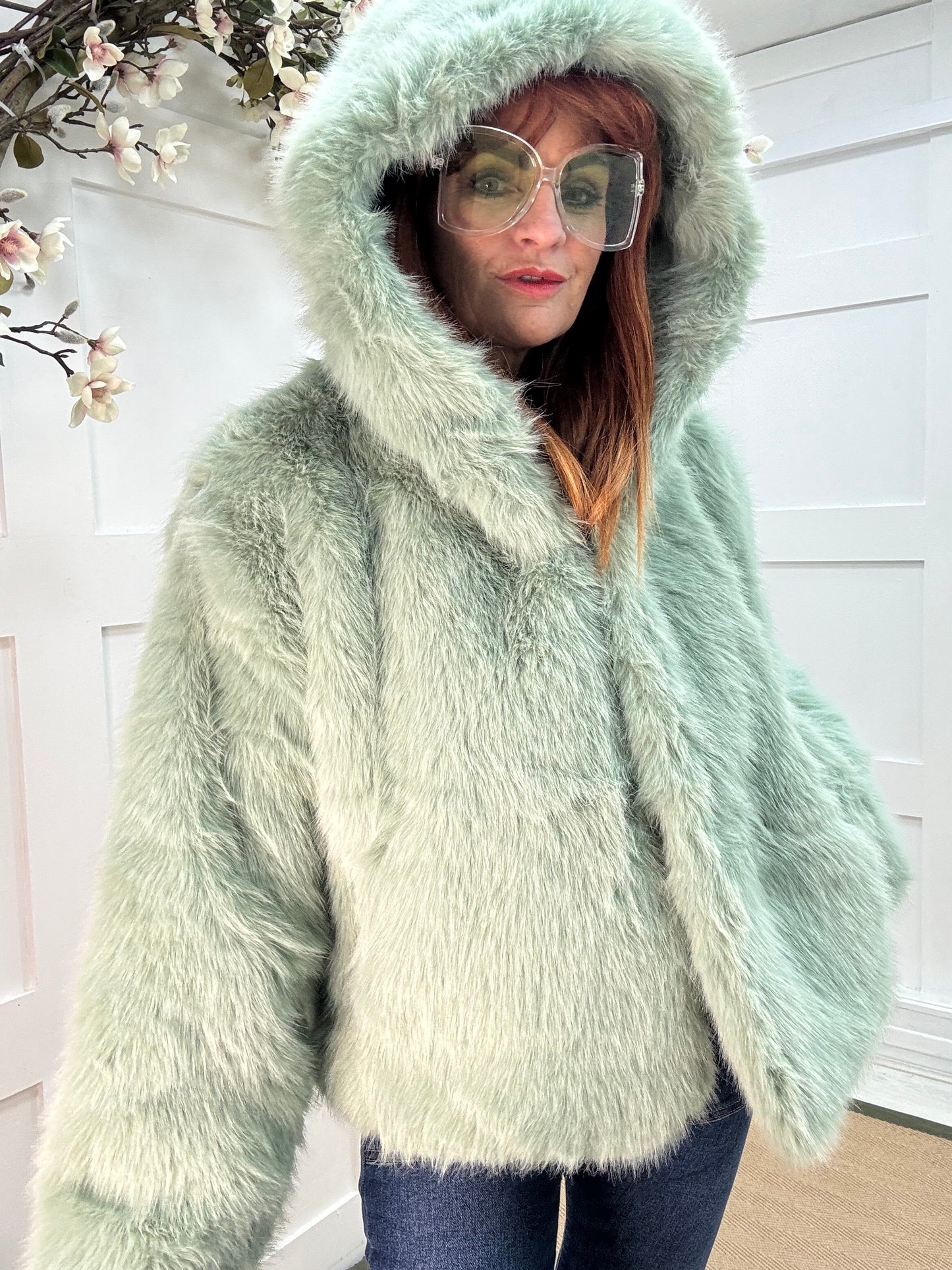 Foxy: Mint green short faux fur hooded jacket. One size 12-16