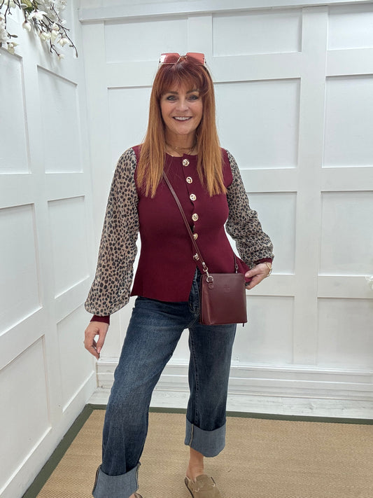Carol: Burgundy leopard print sleeve fitted top. One size 10-14