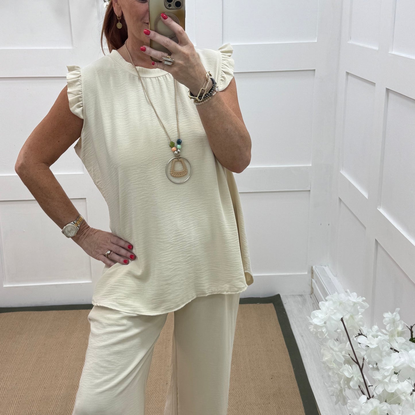 Ember: Cream frill sleeve top & pendant. One size: 14-20