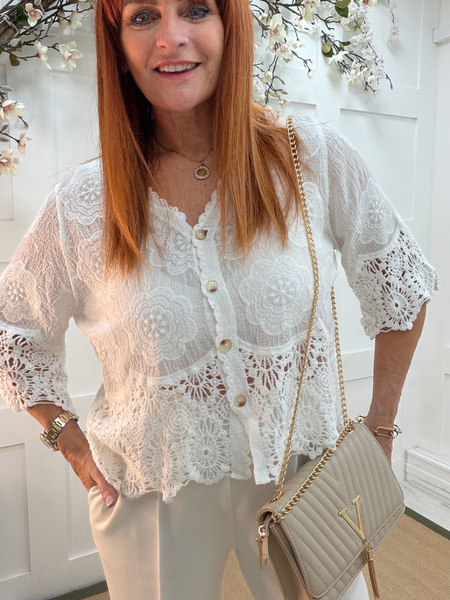 Effie: White embroidered V neck button top. One size: 12-18