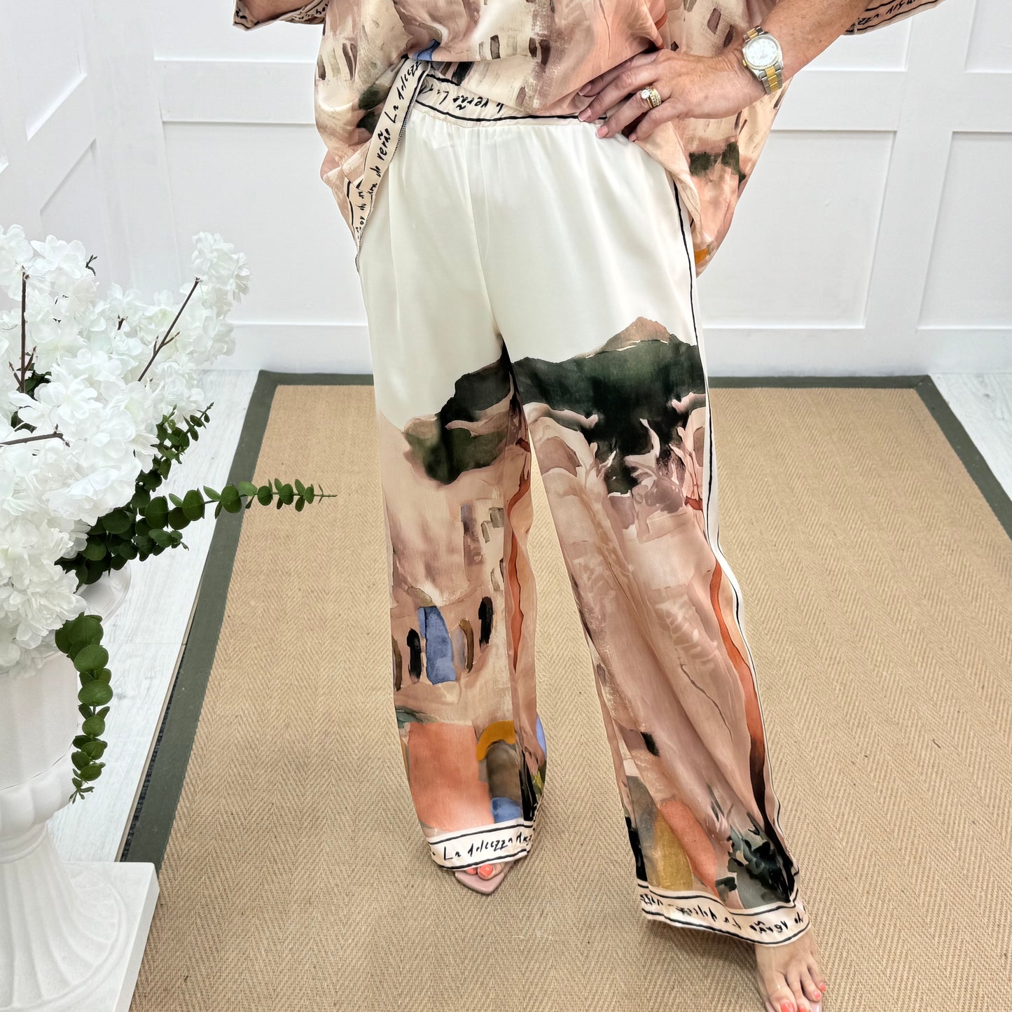 Sophia: Cream silk Amalfi wide leg trousers. One size: 10-16