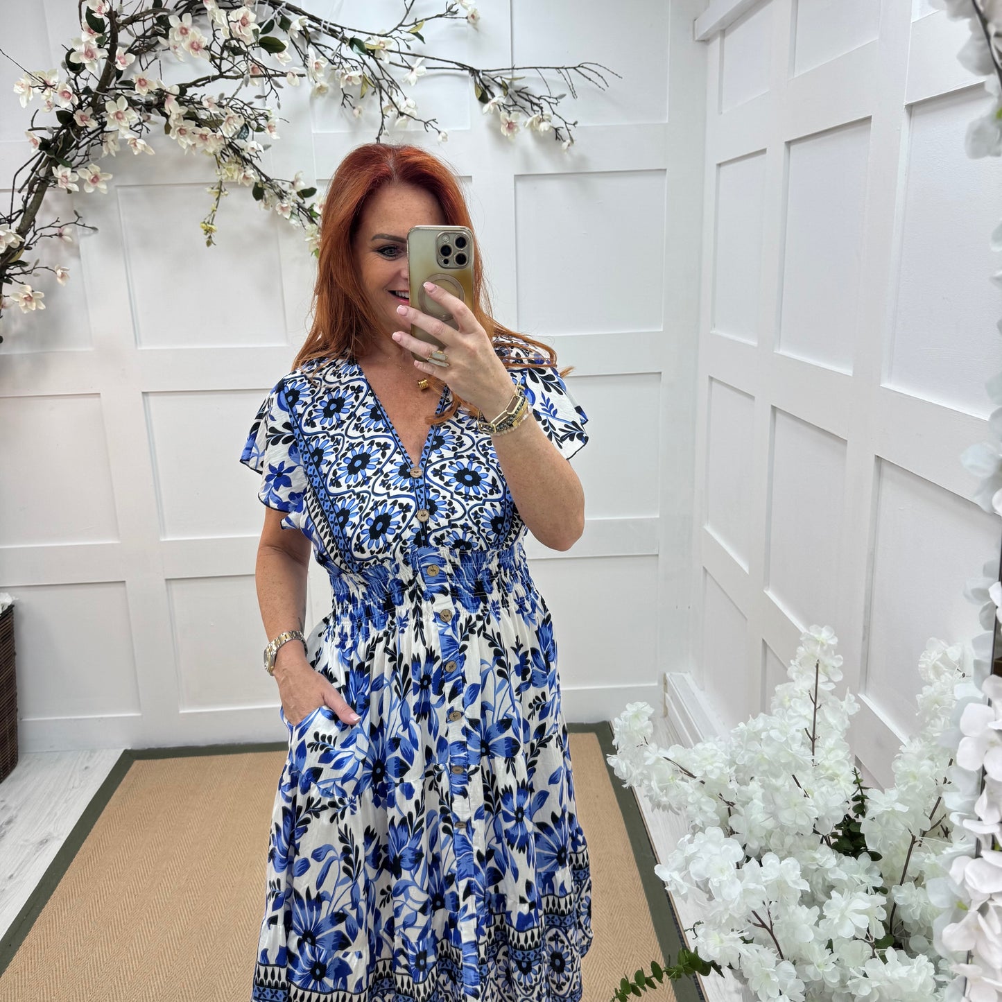 Emmy: Blue & white floral stretchy V neck midi dress. One size: 10-20