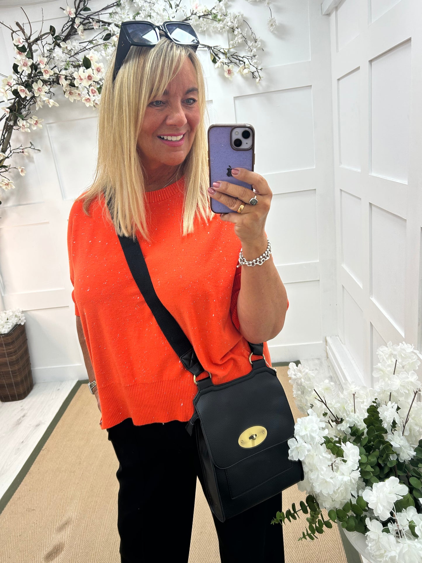 Josie: Orange short sleeve sparkle top. One Sz: 12-18