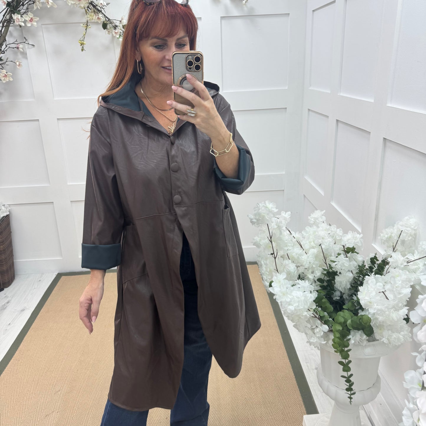 Alma: Brown long hooded raincoat. One size 12-18