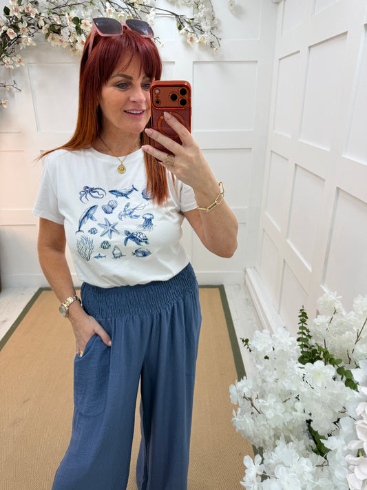 Saylor: White diamanté blue sea-life T shirt. 3 sizes