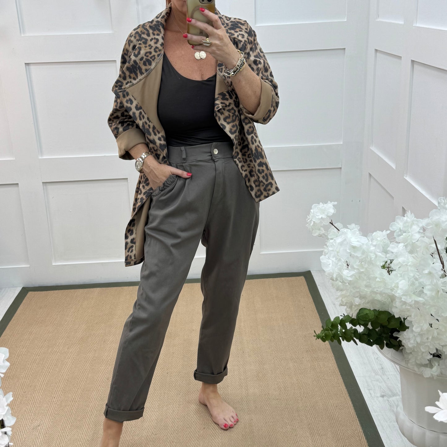 Mandi: Brown stretchy frill pocket magic trousers with rear pockets. One Size: 14-20