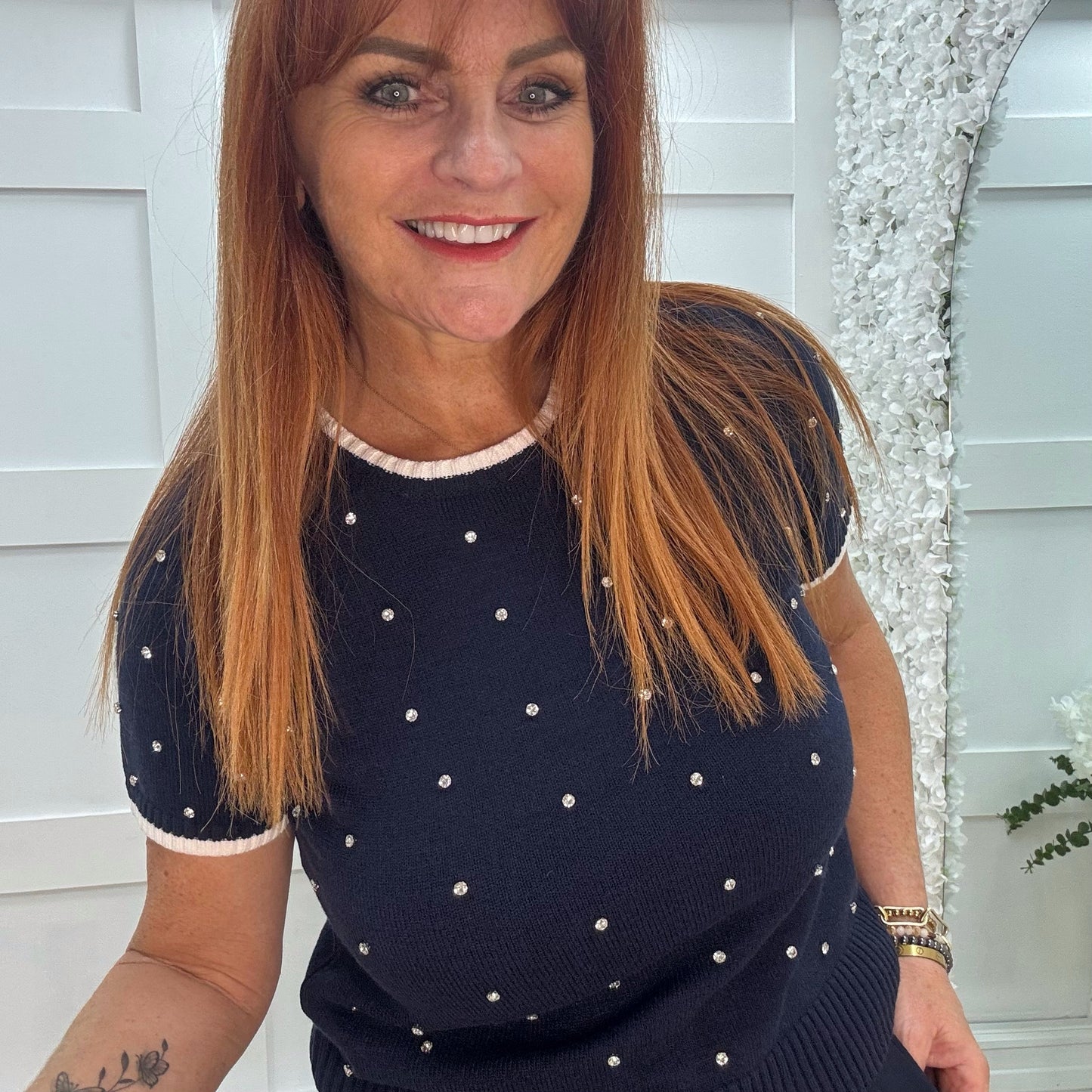 Noelle: Navy stretchy knit rhinestone top. 2 sizes