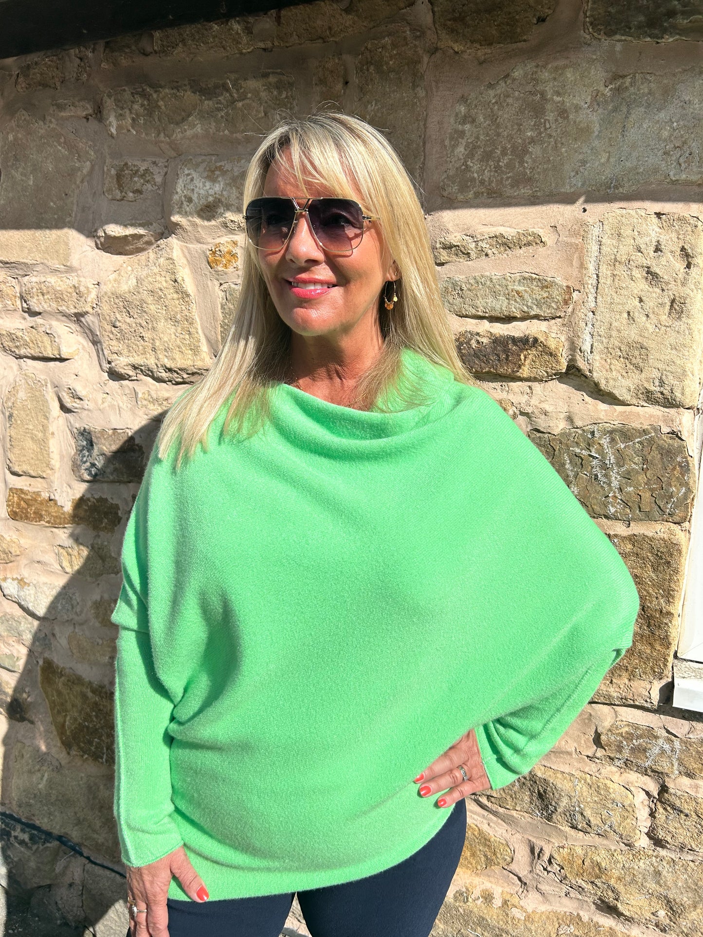 Marcie: Neon lime asymmetrical plain slouch soft knit top. One size 10-18