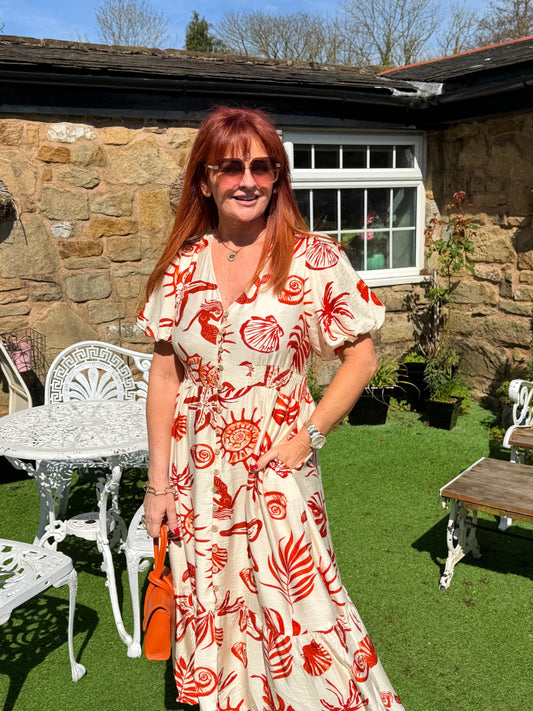 Ruby: Cream & orange coastal print V neck button dress. 4 sizes.