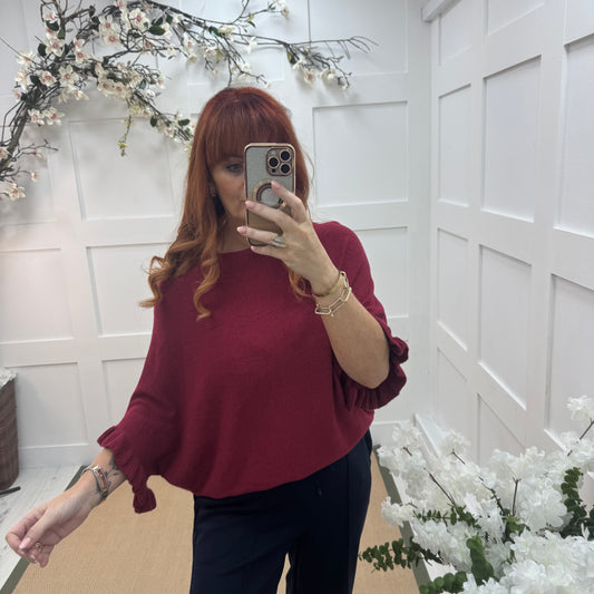 Sierra: Burgundy batwing fluted sleeve knitted top. One Size 12-18/20