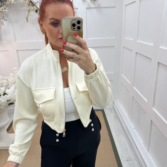 Bunty: Cream stretchy short bomber jacket. One size: 8-16