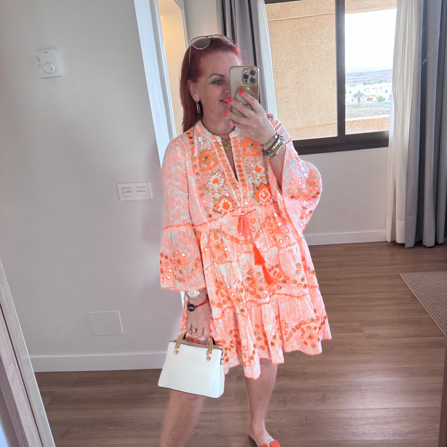 Skylar: Neon orange short embroidered sequin dress. One size: 12-18