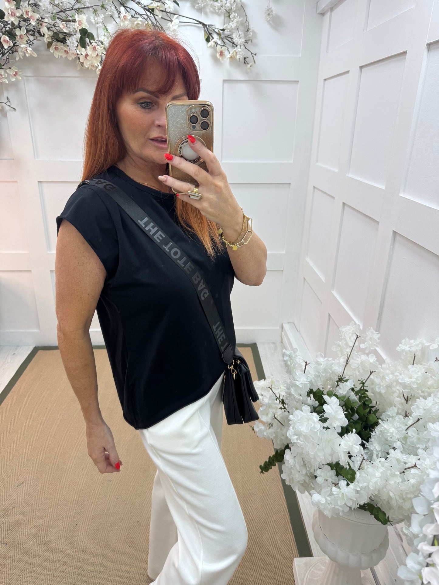 Neve: Basic black cotton T shirt. One size: 10-18